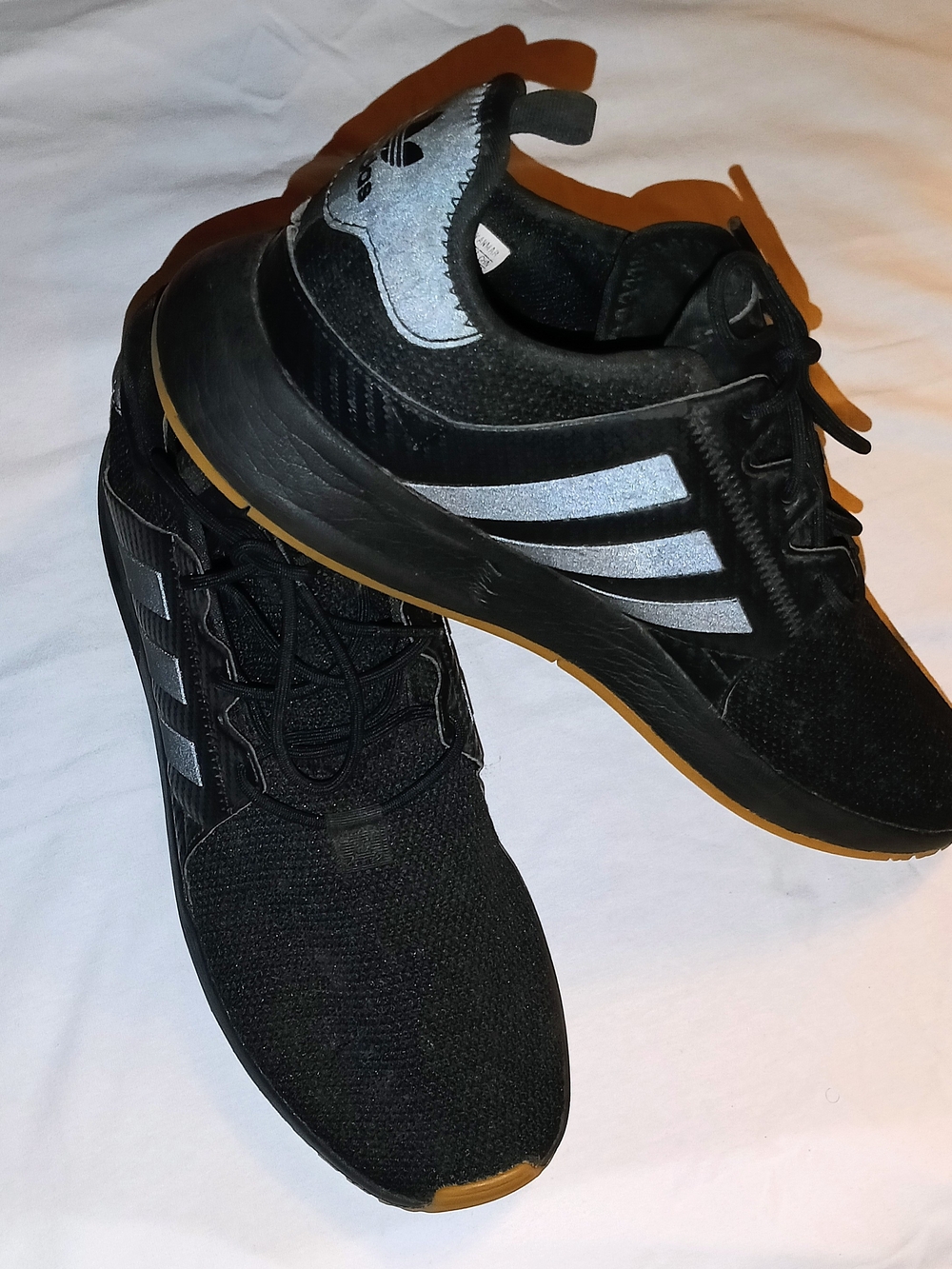Adidas Men's Black Athletic Sneakers with Silver Stripes